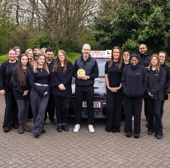 The office team celebrating the award