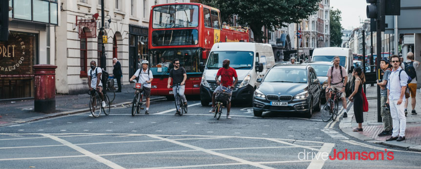 Cyclists at busy junction