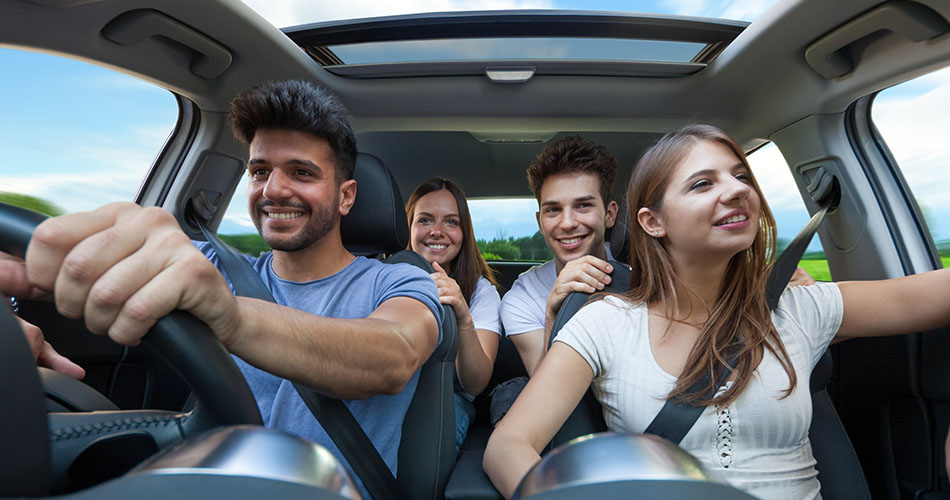 group of friends in car