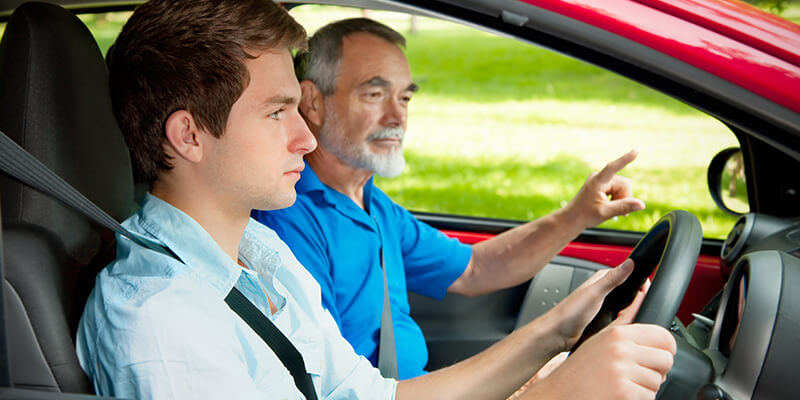 boy learning to drive