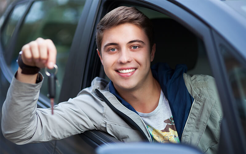 boy-holding-car-keys