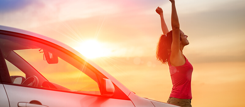 woman stretching in sunset