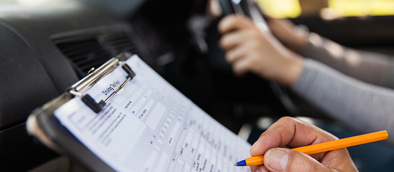 driving test marking sheet in car