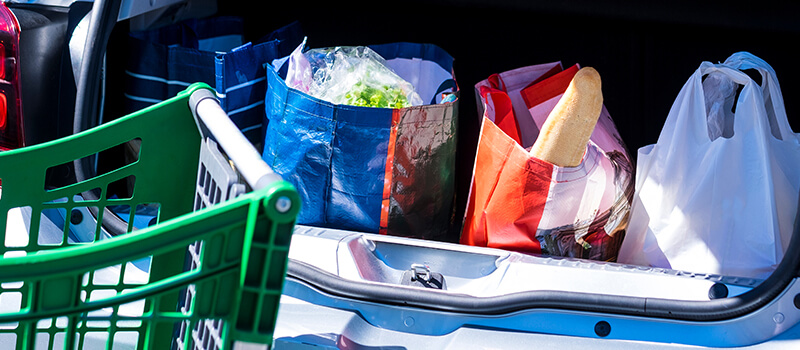 shopping bags in boot of car