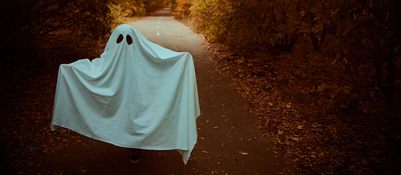 child dressed up as ghost