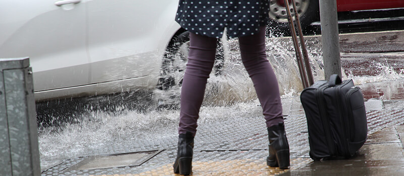 pedestrian splashed with water