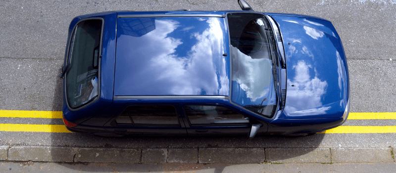 car parked on double yellow lines