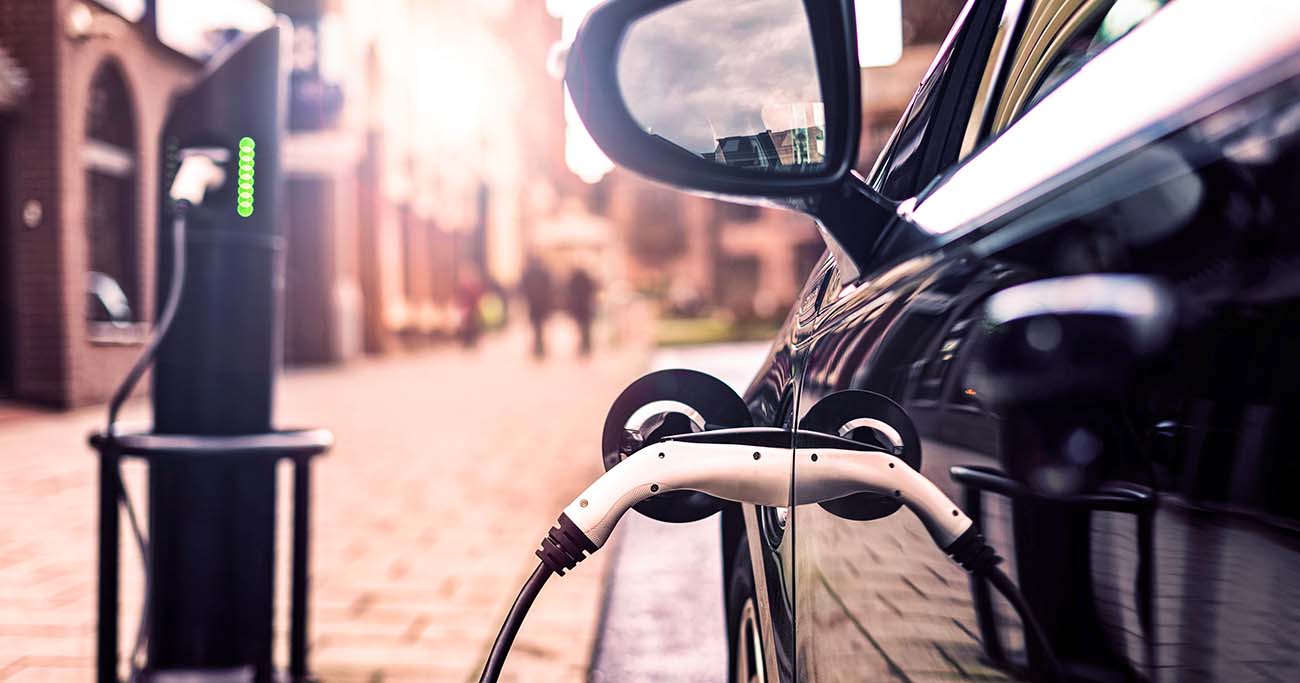 parked electric car being charged