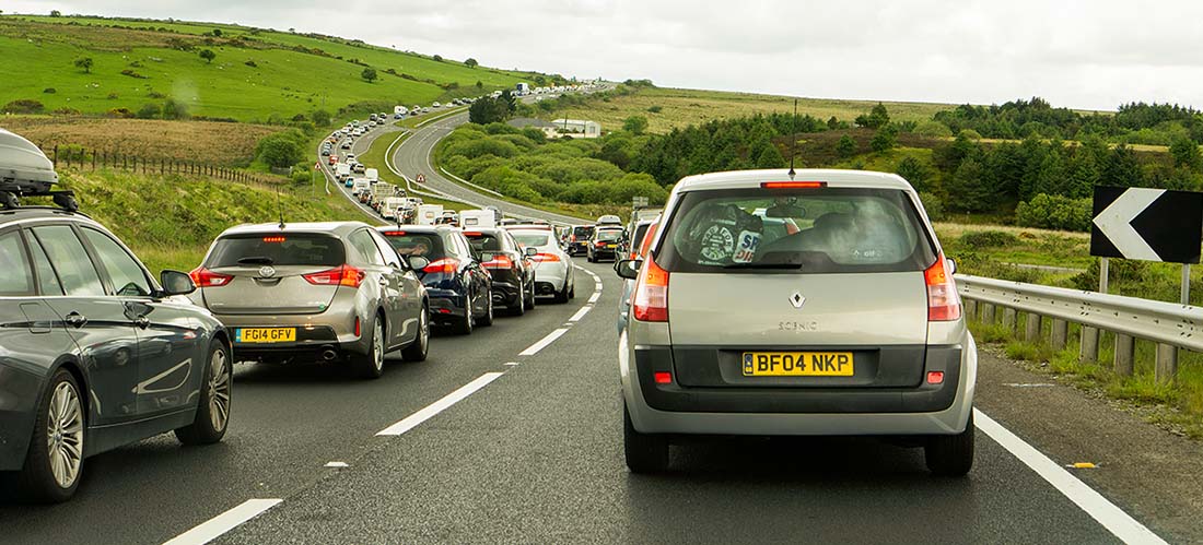 slow moving traffic, rear wheels on tarmac