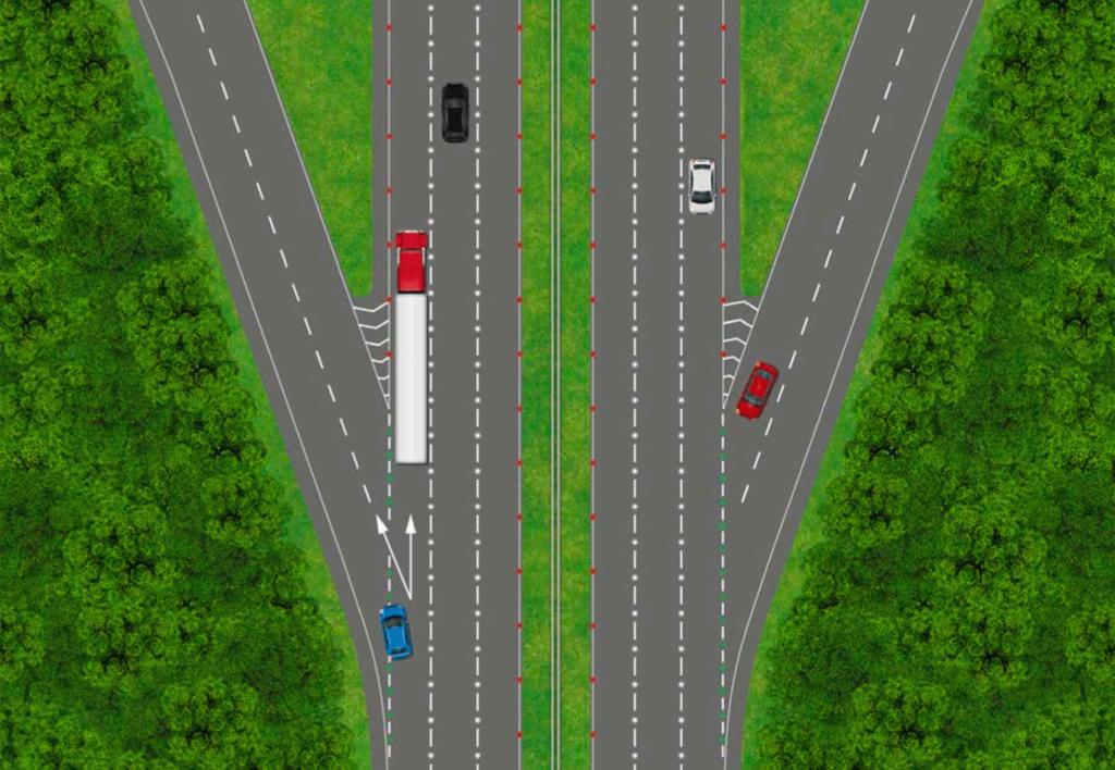 A three lane motorway with vehicles on it