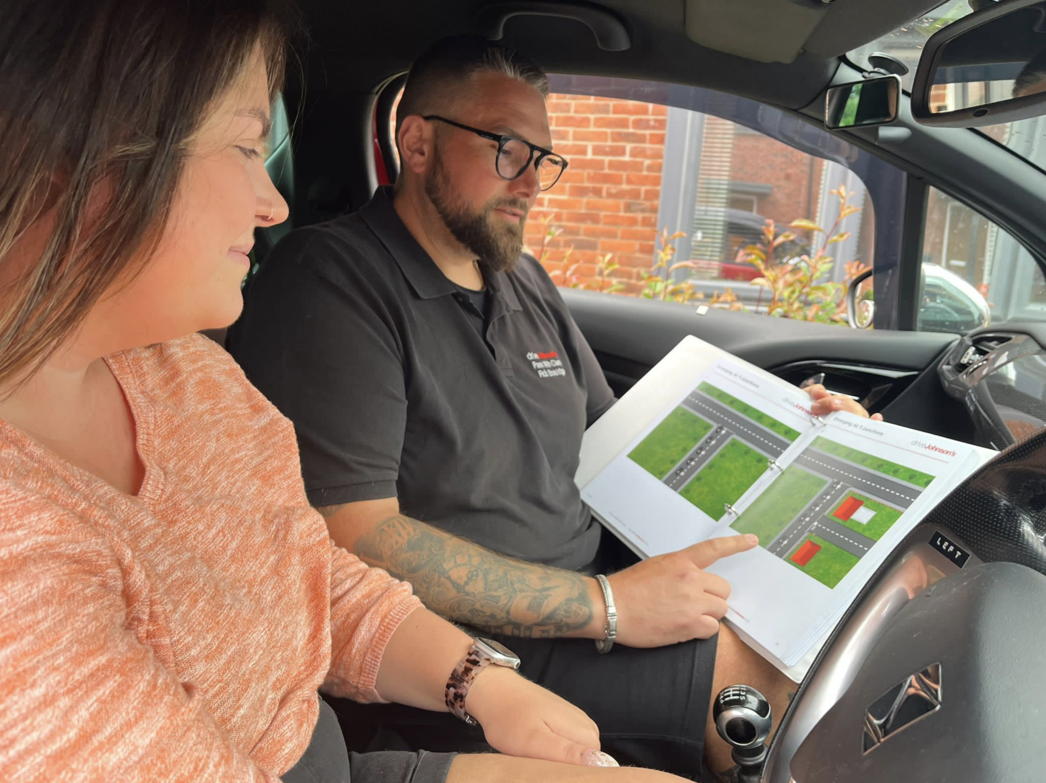 Driving instructor with pupil
