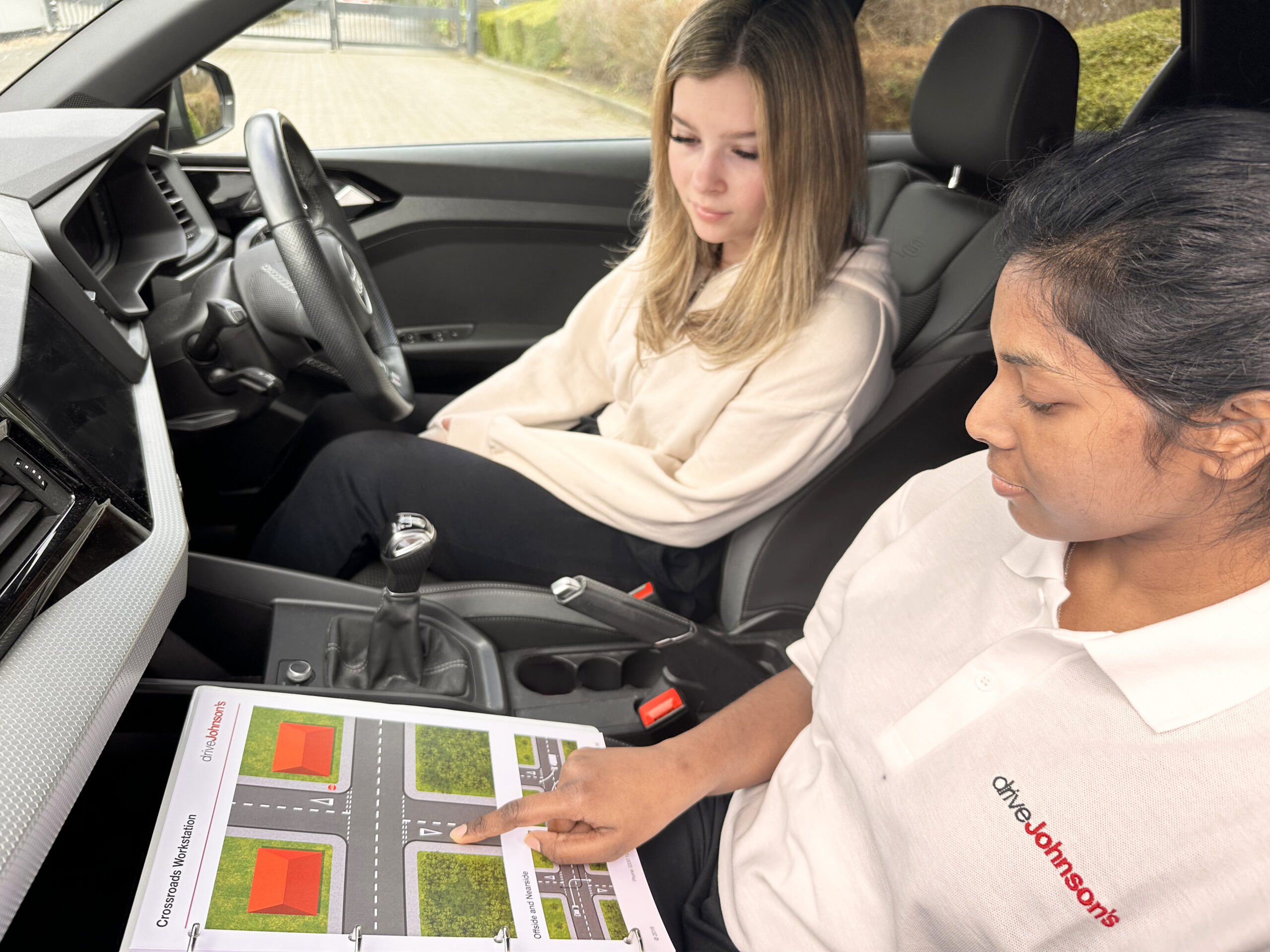 Girl happy in driving lesson
