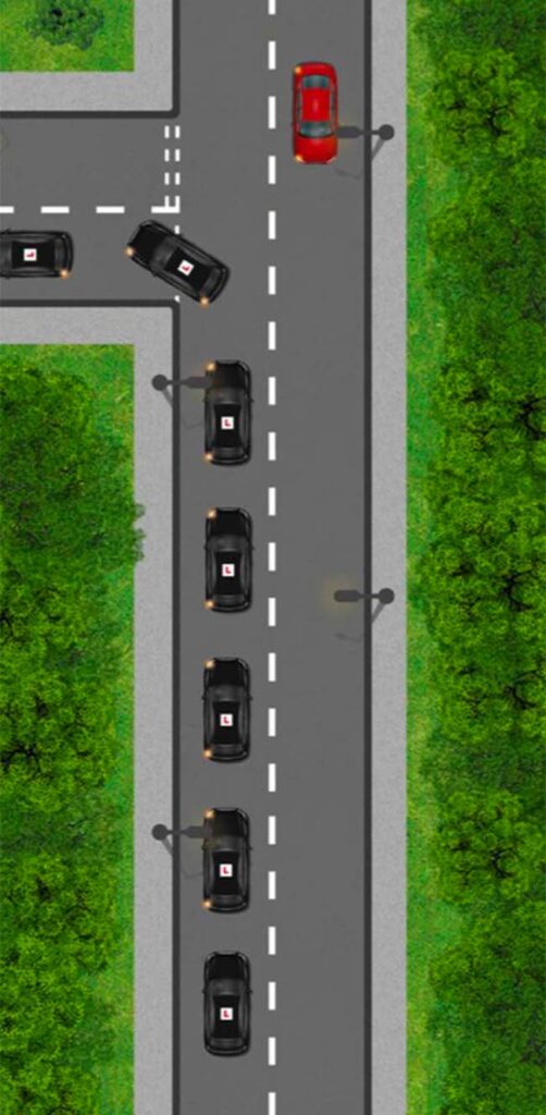 Car turning left from a major road to a minor road