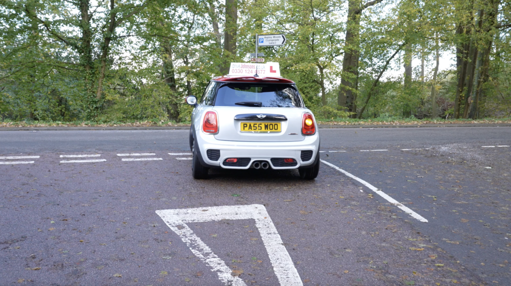 Mini turning right at a T Junction