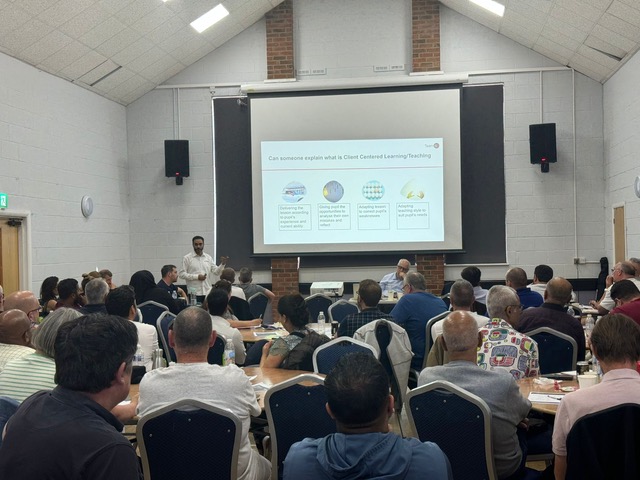 Driving instructor training in a conference hall