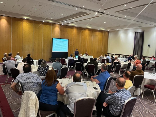 Driving instructors in training and development meeting