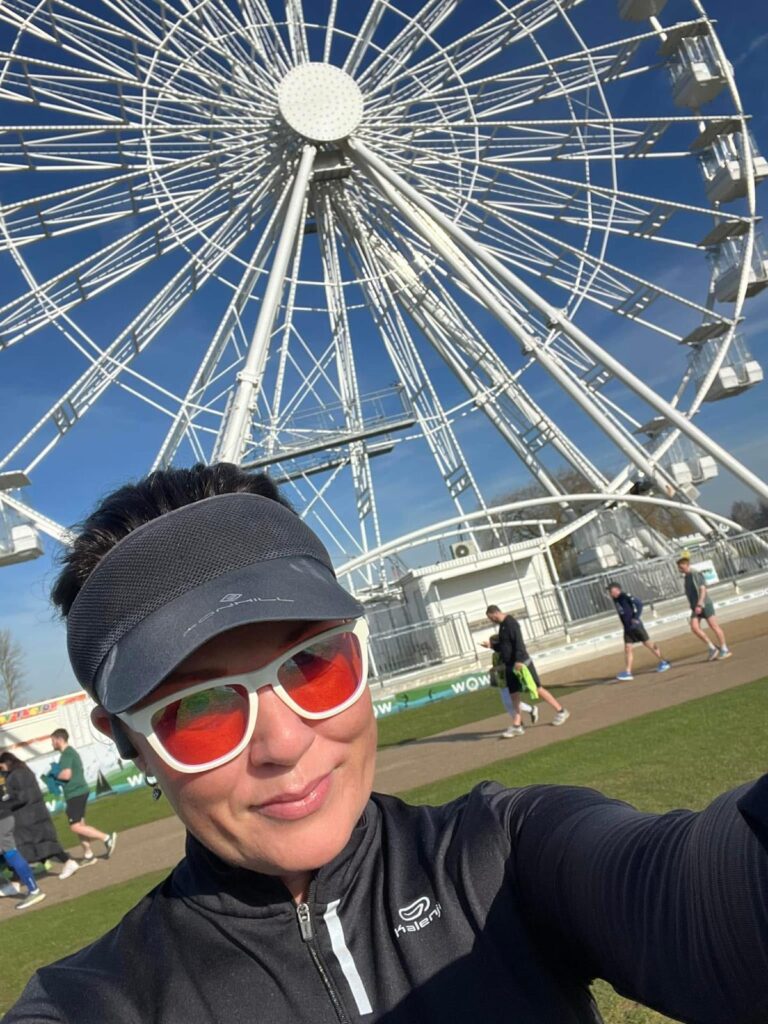 Nicki by the ferris wheel at Willen Lake in Milton Keynes
