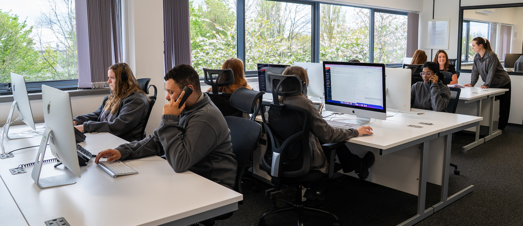 driveJohnson's office team taking phone calls