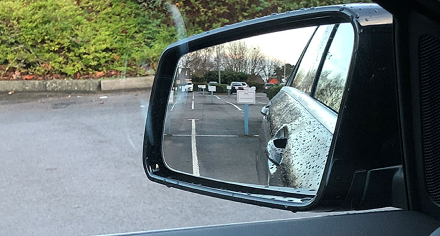 View of car door side mirror