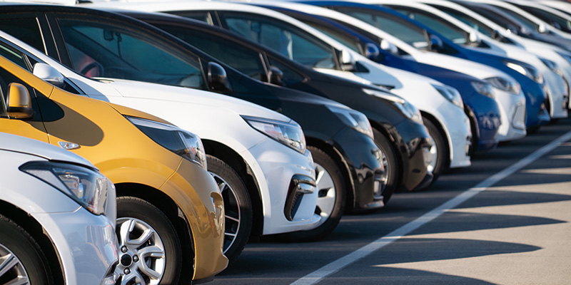 Row of cars parked next to each other