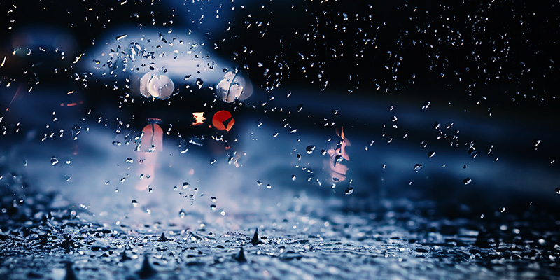 Blurred car in the rain
