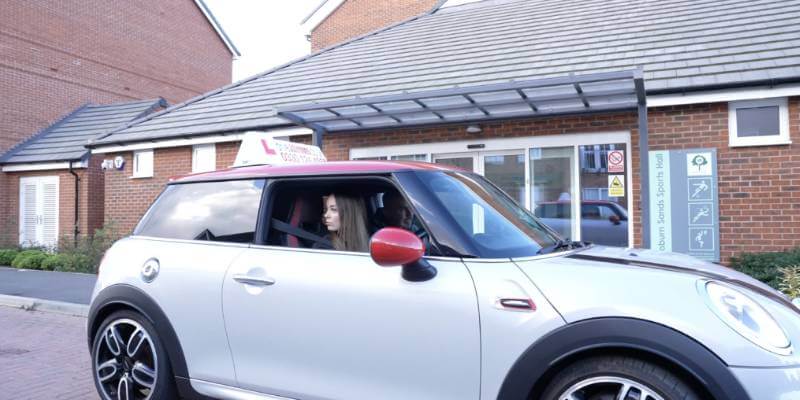 Learner in a driveJohnson's mini about to move off from the side of the road