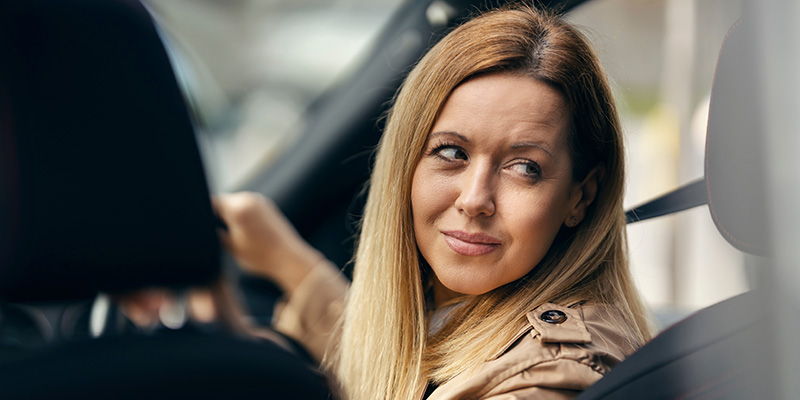 Woman looking back over her shoulder