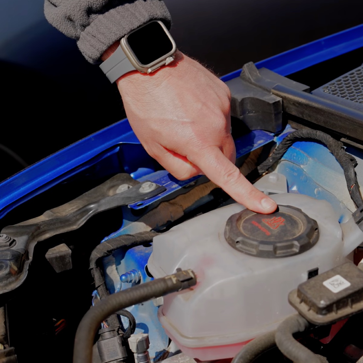 Engine coolant cap under bonnet