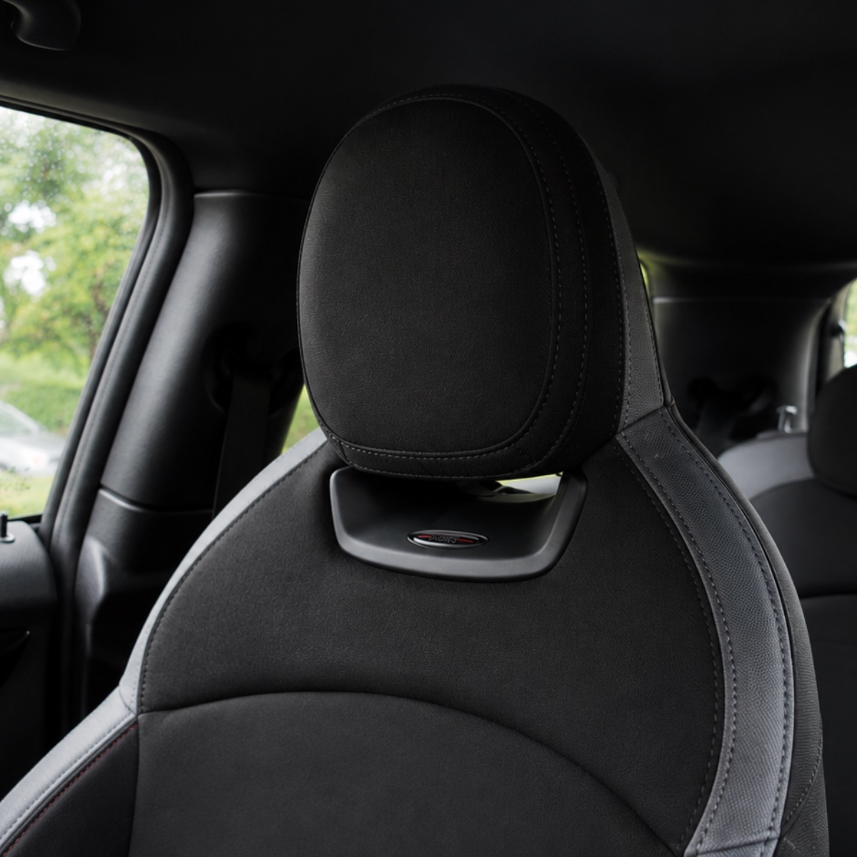Drivers side head restraint