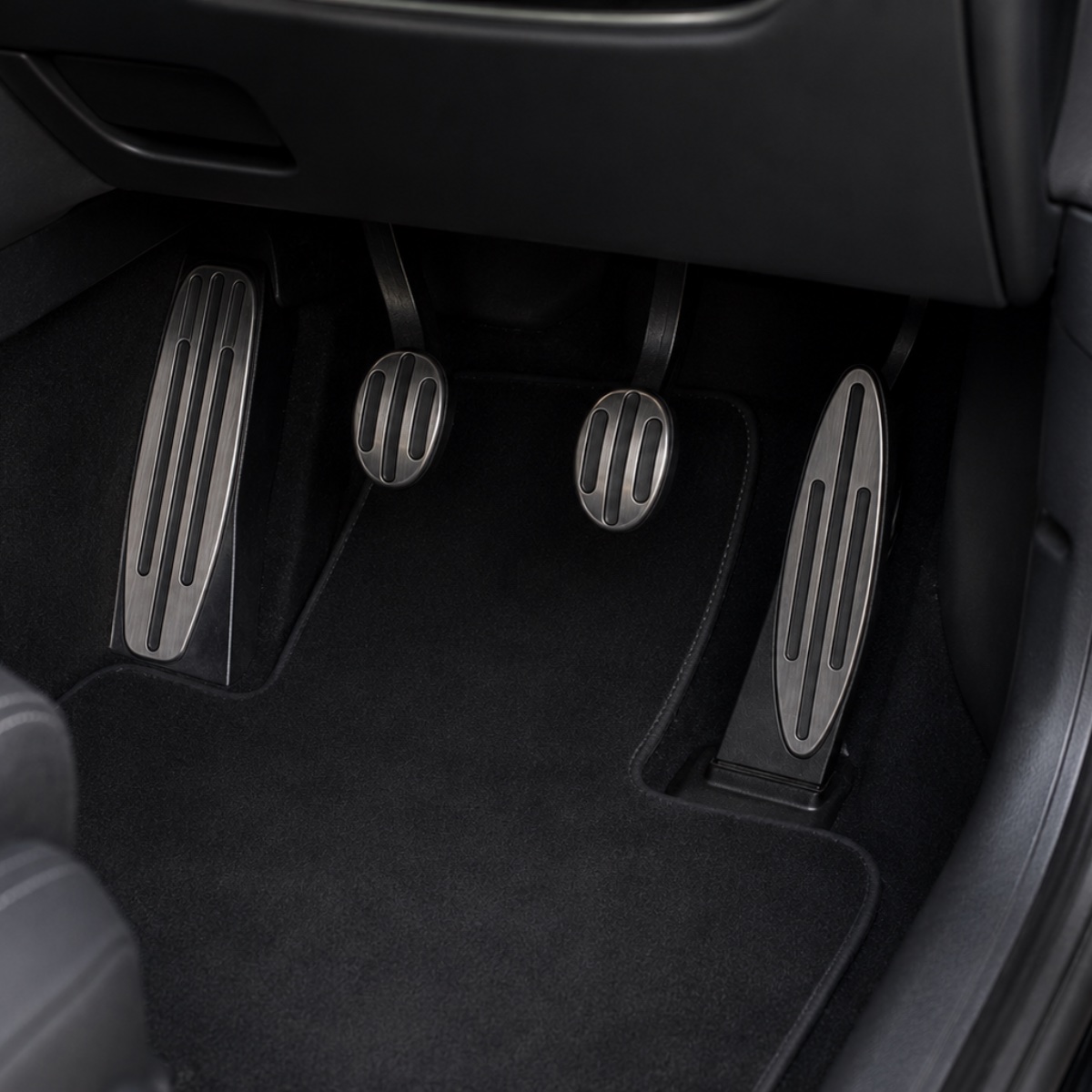 Clutch, brake and accelerator pedals in a Mini