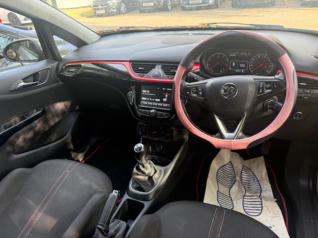 Inside view of Vauxhall Corsa Special Edition Griffin 1.4L manual transmission petrol car with dual controls for driving instructors