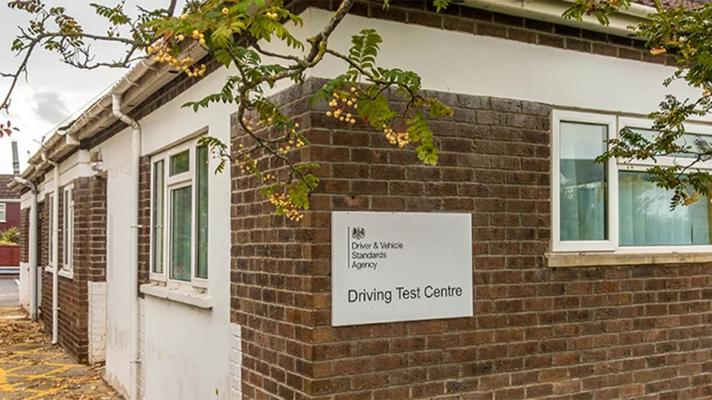 Image of a building with 'driving test centre' sign